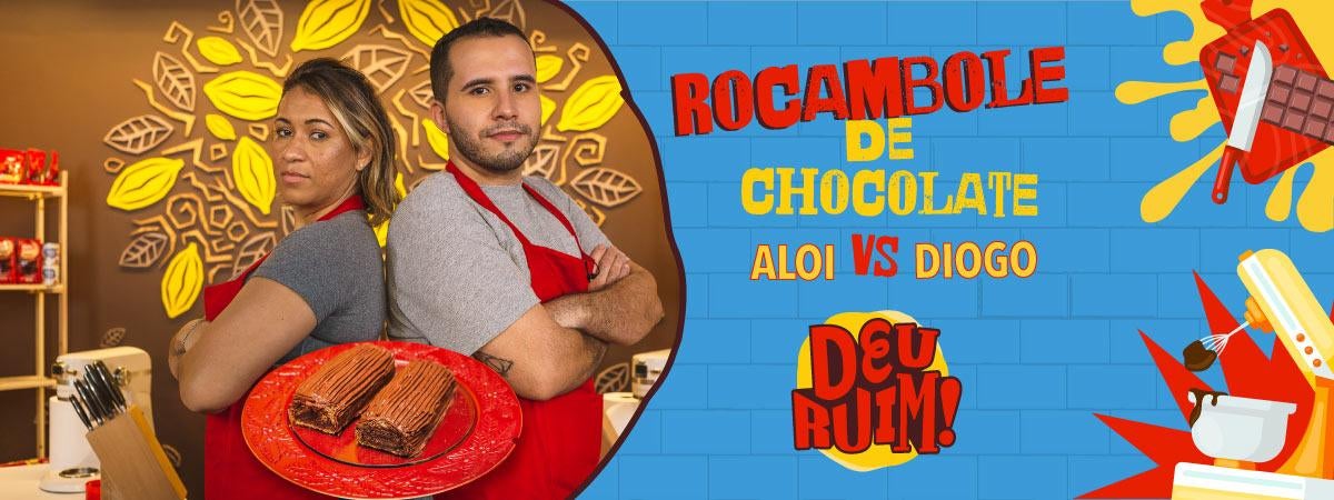 Rocambole de Chocolate Aloí vs Diogo Imagem escrito Rocambole e Aloi vs Diogo seguido pelo logo Deu Ruim. À esquerda, fotos dos participantes e do rocambole.