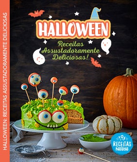 Recipe Imagem de um bolo verde decorado como monstro e abóboras ao fundo, com o título Halloween Card Image