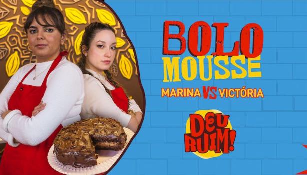 Imagem escrito Bolo Mousse e Marina vs Victória seguido pelo logo Deu Ruim. À esquerda, fotos das participantes e do bolo.