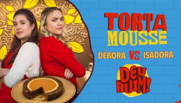 Imagem escrito Torta Mousse e Isadora vs Débora seguido pelo logo Deu Ruim. À esquerda, fotos das participantes e da torta.