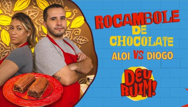 Imagem escrito Rocambole e Aloi vs Diogo seguido pelo logo Deu Ruim. À esquerda, fotos dos participantes e do rocambole.