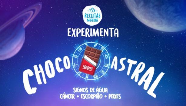 Imagem em tom roxo do céu com alguns planetas, uma barra de chocolate ao centro e um mulher com um braço levantado e dizeres