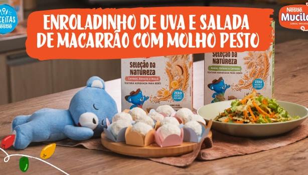 Fotografia de uma salada de macarrão e doce de uva e logo de Receitas Nestlé e Mucilon.