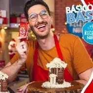 Montagem de um rapaz com uma casa feita de chocolates sobre uma bancada e ao lado direito os dizeres com o título do vídeo
