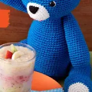 Fotografia da receita de smoothie de frutas com o título e o logotipo de Mucilon e Receitas Nestlé.