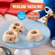 Fotografia do manjar ao centro com um ursinho azul e logos das marcas