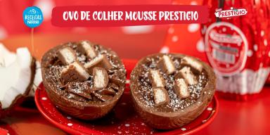 Montagem com um fundo em tons de vermelho, a foto da receita com as cascas do ovo recheadas ao centro, o nome do programa e o