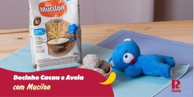 Fotografia de bancada com um bowl laranja e docinho dentro