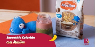 Fotografia de bancada com um copo com bebida colorida dentro