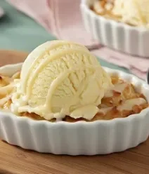 Receitas para o Final de Semana Foto aproximada da receita de cocada gratinada com moça topping