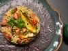 PF Mexidão com arroz, frango e linguiça dourados, servido com creme aveludado de feijão-preto, coentro fresco e toque cítrico de limão.