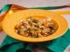 Baião de dois cremoso com carne seca, feijão-fradinho, queijo coalho e coentro