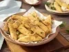 Imagem de um bowl com iscas de tilápia frita.