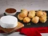 Arancini de parmesão com recheio cremoso de brie, crocante por fora, macio por dentro e perfeito para ocasiões especiais.