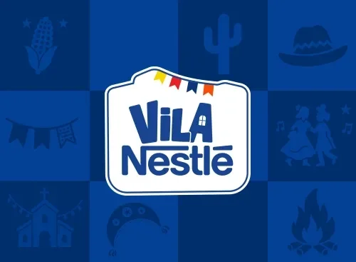 Logo da Vila Nestlé com elementos juninos em fundo azul, inspirado no São João de Caruaru.