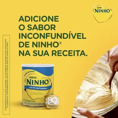 Banner promocional de Nestlé NINHO Leite Integral com imagem de massa sendo preparada e lata do produto.