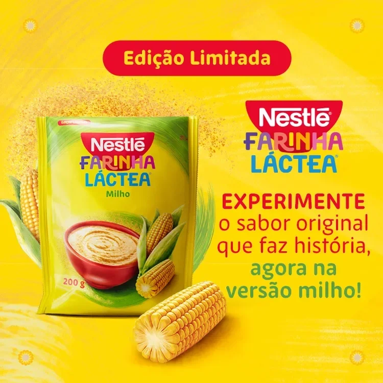 Capa promocional da Farinha Láctea Milho, com embalagem, espigas de milho e texto “Experimente a versão milho”.